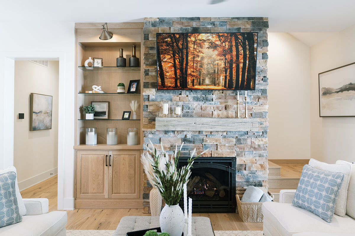 stone fireplace and built in shelves